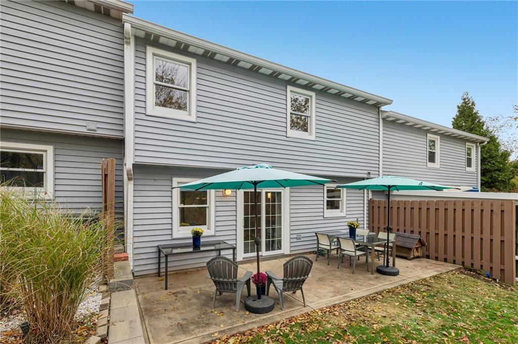 416 Chandler Place Pittsburgh, PA 15212 - Photo 37 of 38 a view of a patio with couches chairs and potted plants