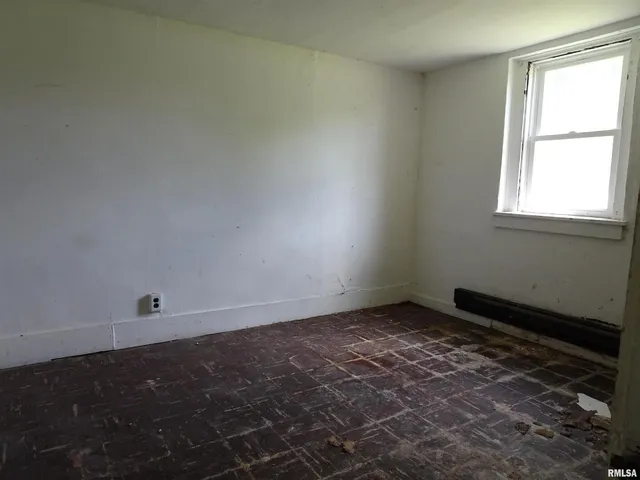 a view of a building with a yard