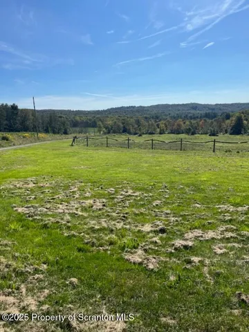 a view of a lake with a city