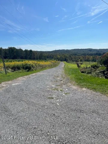 a view of a lake with a big yard