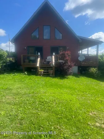 a view of a porch in front of house