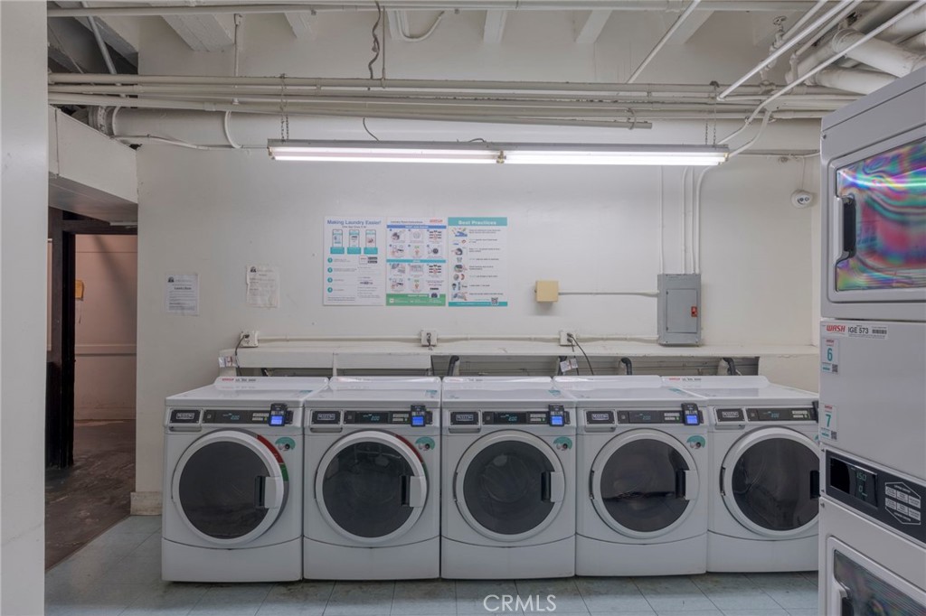 315 West 3rd Street, Unit 710 Long Beach, CA 90802 - Photo 12 of 14 a utility room with dryer and washer