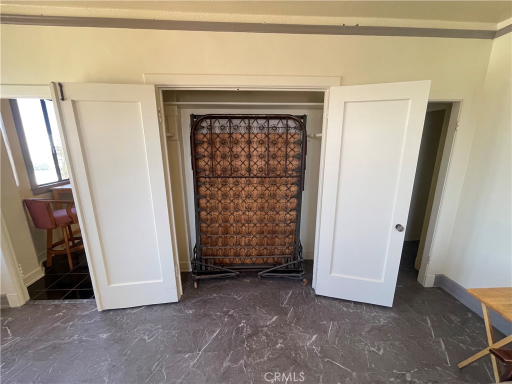 315 West 3rd Street, Unit 710 Long Beach, CA 90802 - Photo 7 of 14 a view of front door with wooden floor