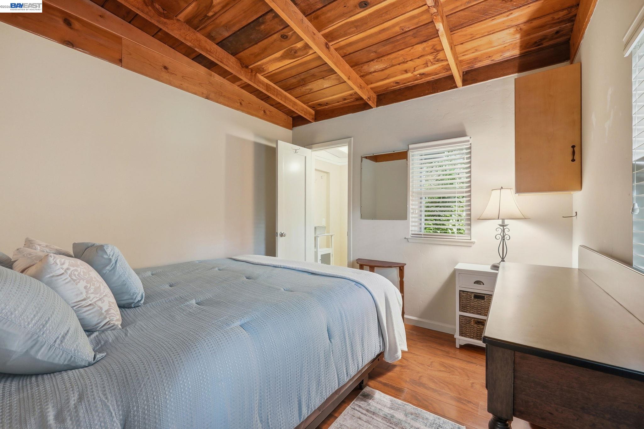 11700 Oak Road Forestville, CA 95436 - Photo 8 of 20 a bedroom with a bed and a desk