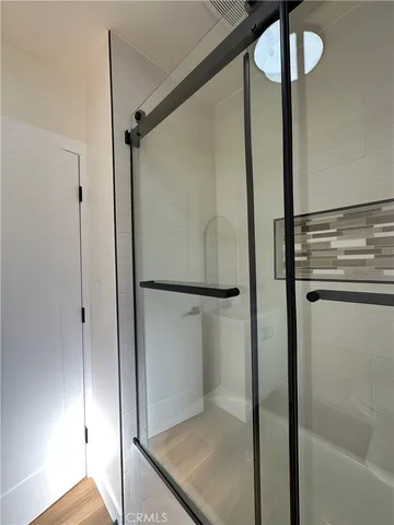 a room with a sink and a mirror