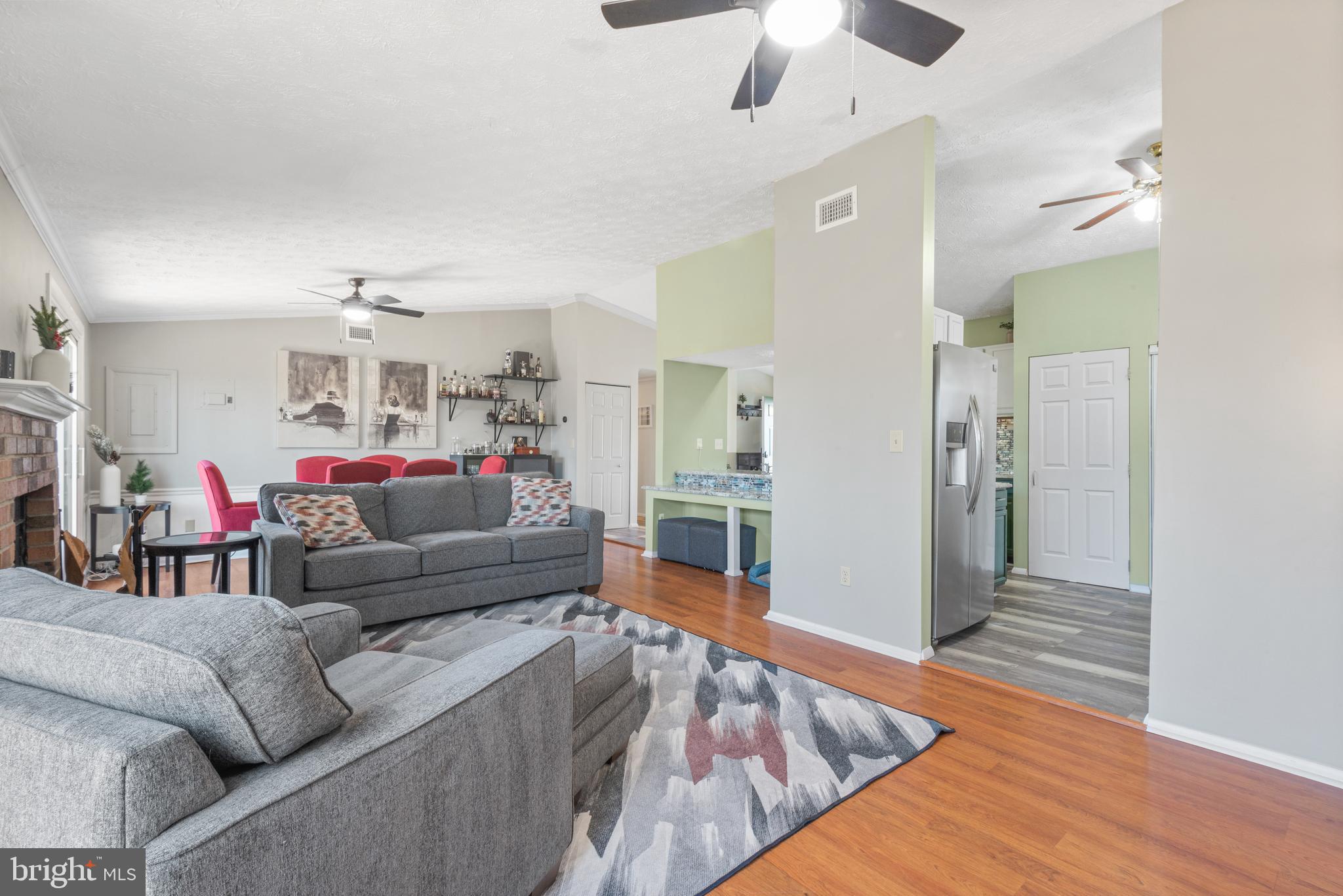 4535 Cub Run Road Chantilly, VA 20151 - Photo 11 of 49 a living room with furniture and a wooden floor