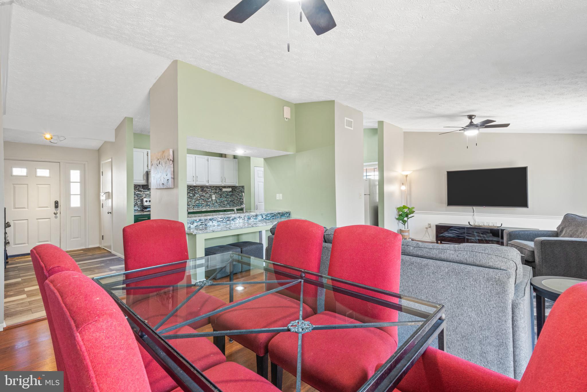 4535 Cub Run Road Chantilly, VA 20151 - Photo 13 of 49 a living room with furniture and a flat screen tv