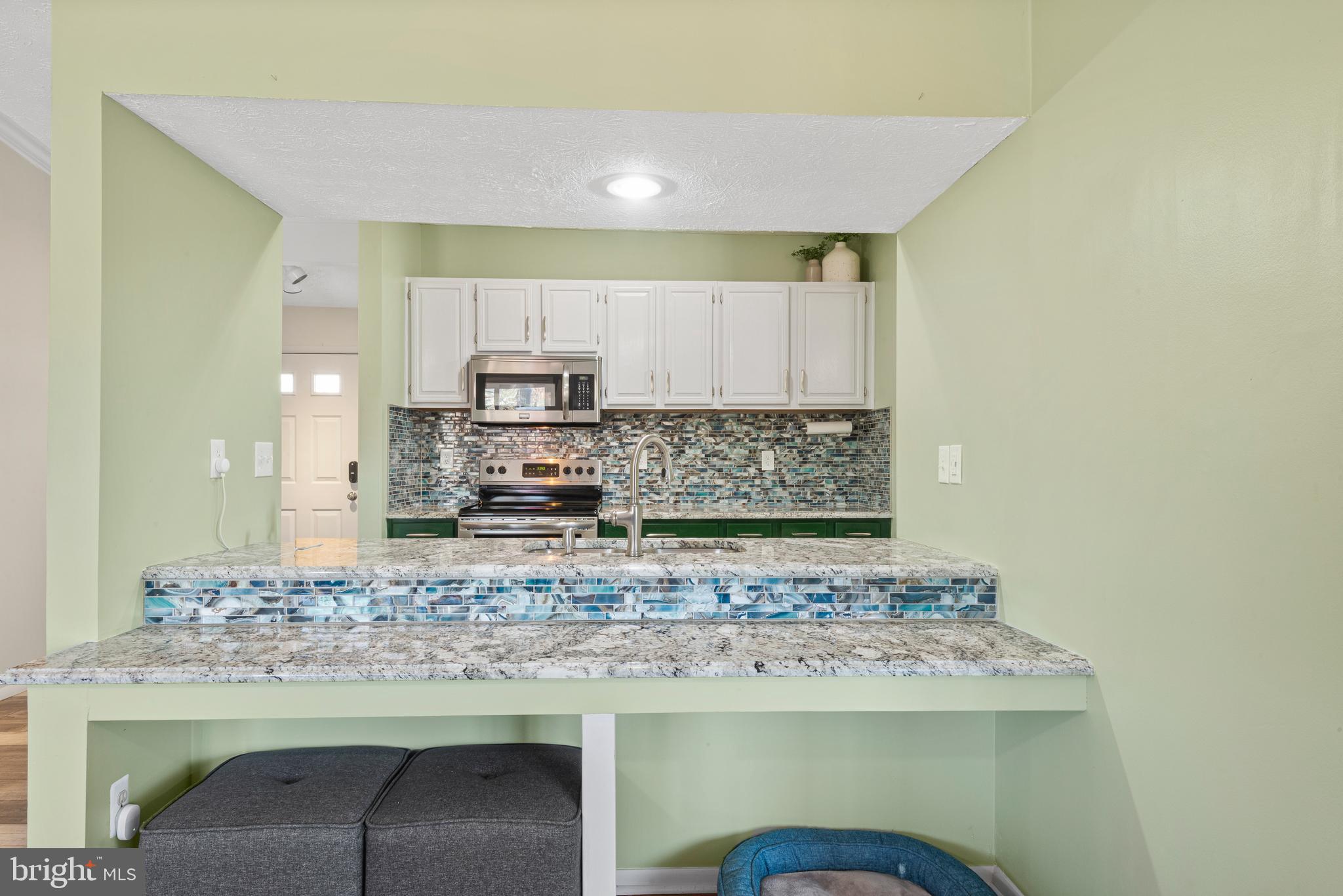 4535 Cub Run Road Chantilly, VA 20151 - Photo 15 of 49 a view of kitchen with kitchen island sink stove and refrigerator