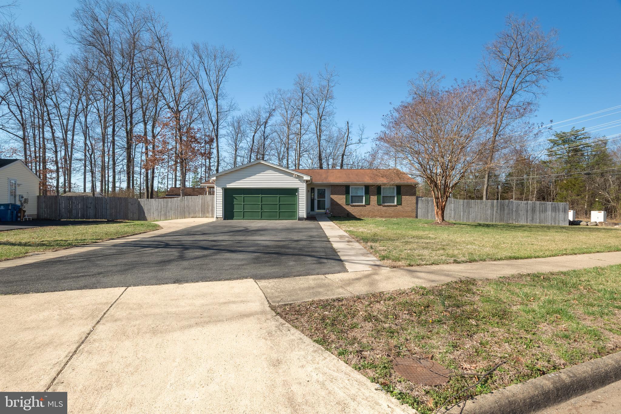 4535 Cub Run Road Chantilly, VA 20151 - Photo 2 of 49 a view of a yard with large trees