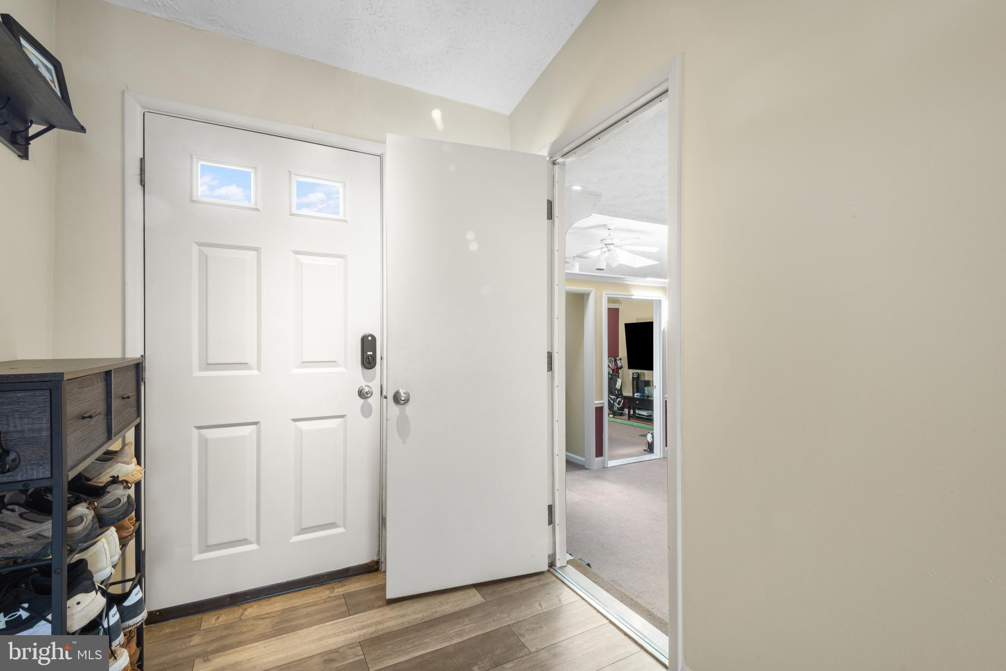 4535 Cub Run Road Chantilly, VA 20151 - Photo 33 of 49 a view of a hallway with wooden floor and closet