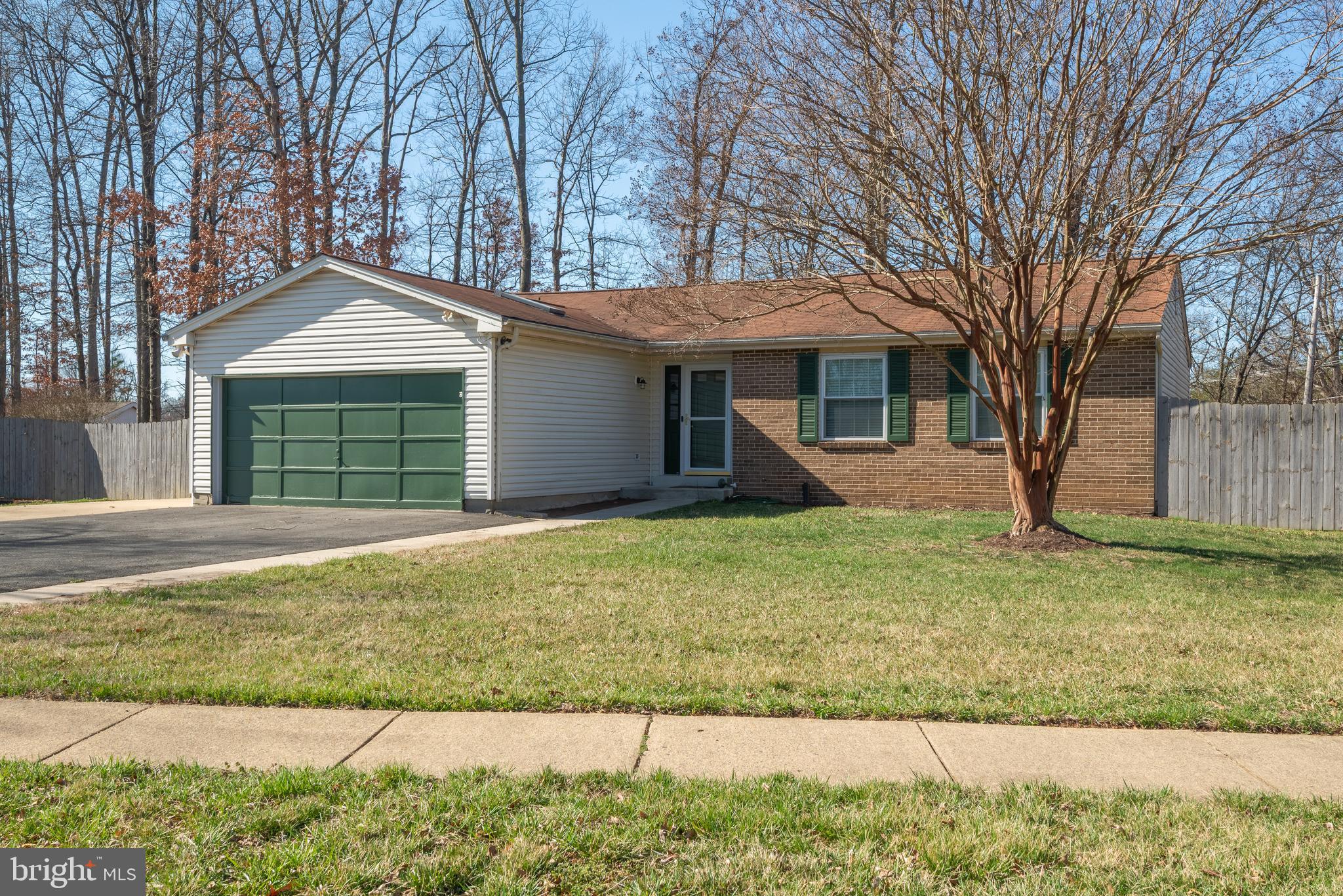 4535 Cub Run Road Chantilly, VA 20151 - Photo 46 of 49 a front view of a house with a garden