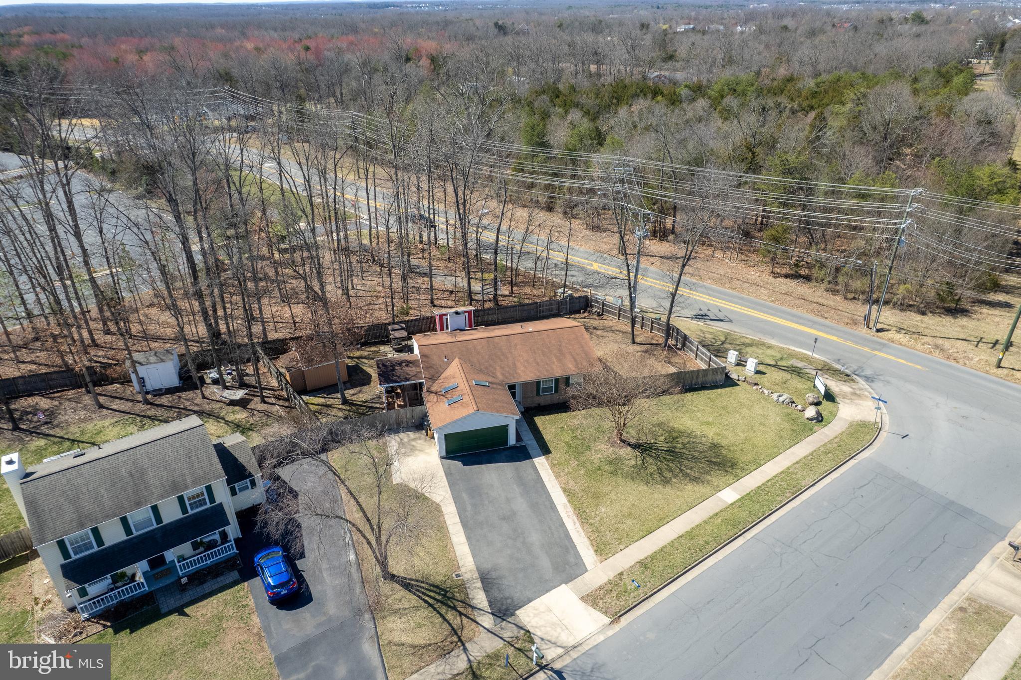4535 Cub Run Road Chantilly, VA 20151 - Photo 48 of 49 a view of a patio with chairs and a table