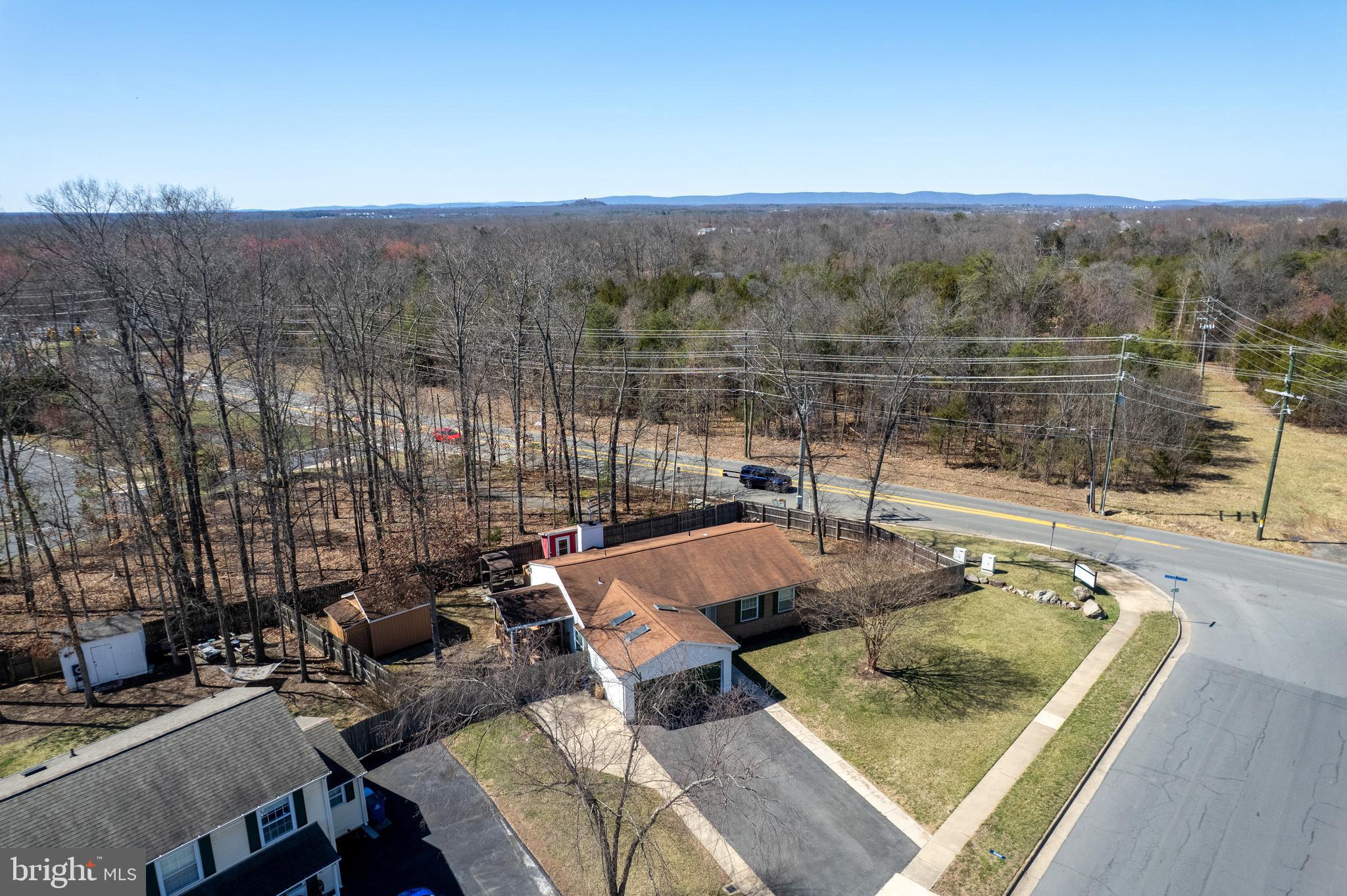 4535 Cub Run Road Chantilly, VA 20151 - Photo 49 of 49 a view of roof deck with two couches and sky view