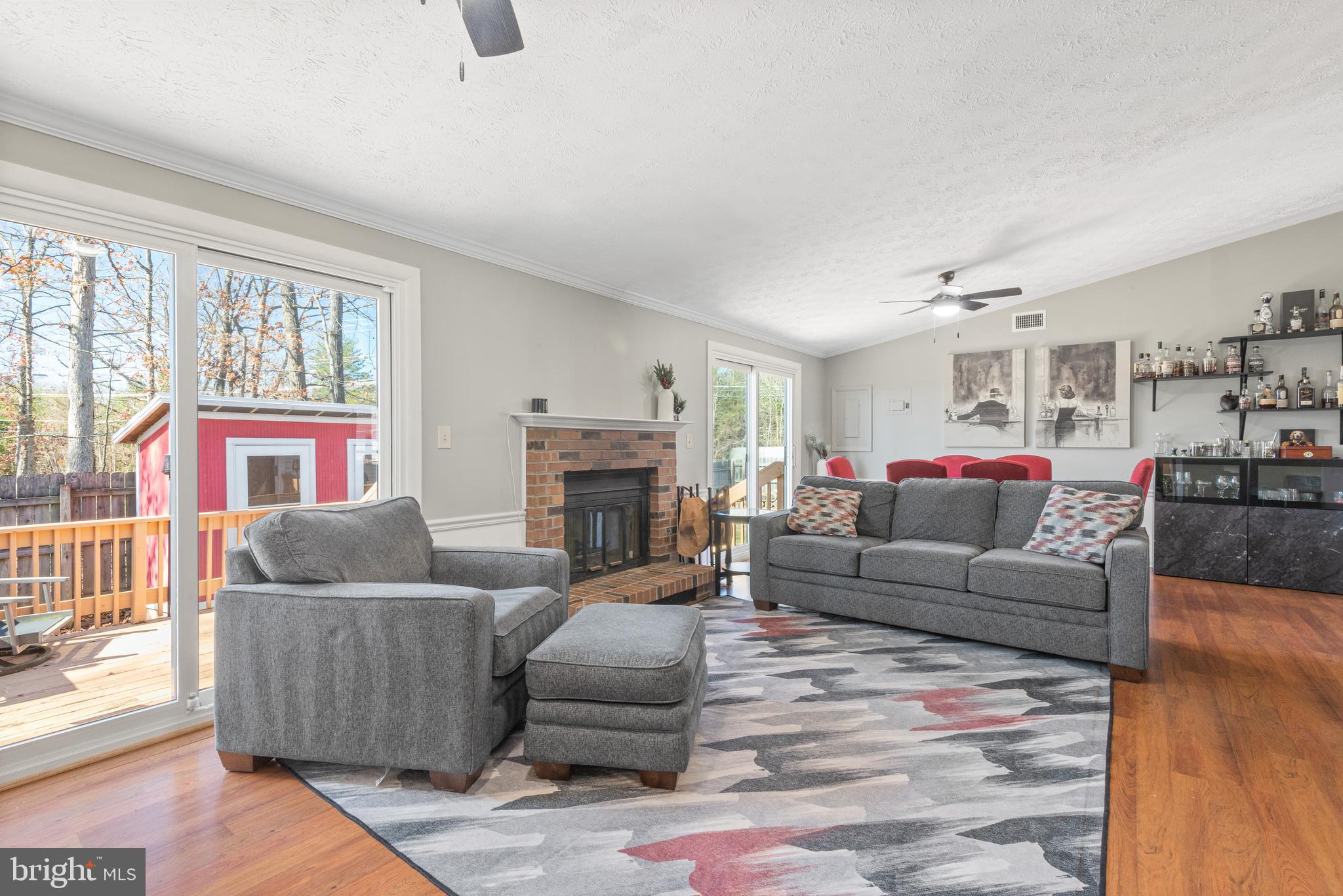 4535 Cub Run Road Chantilly, VA 20151 - Photo 7 of 49 a living room with furniture and a fireplace