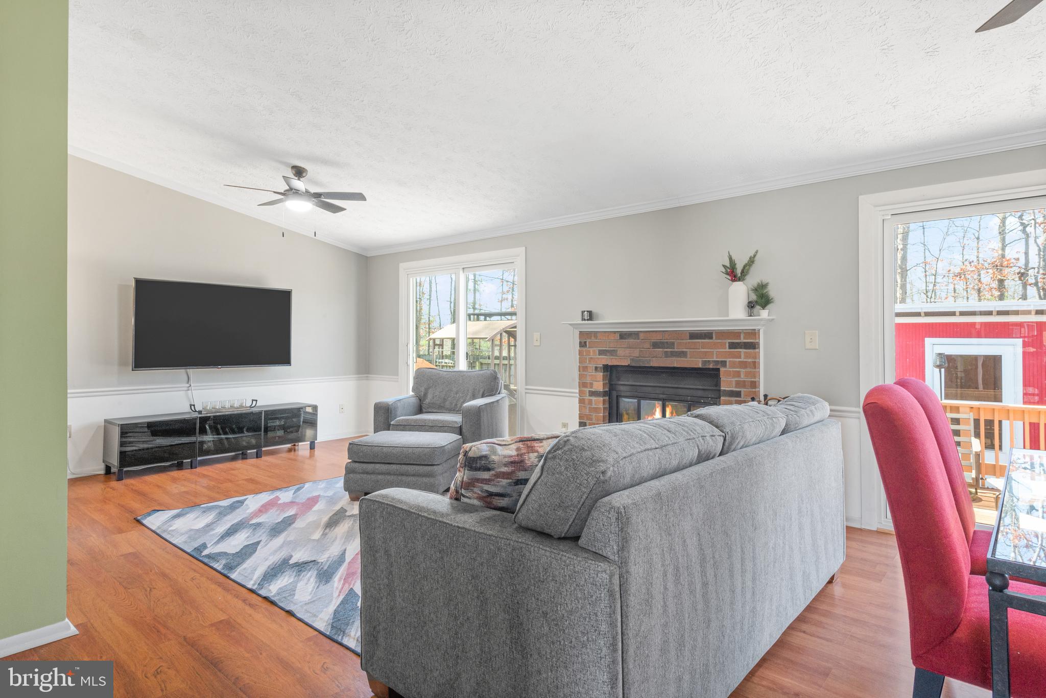 4535 Cub Run Road Chantilly, VA 20151 - Photo 9 of 49 a living room with furniture and a flat screen tv