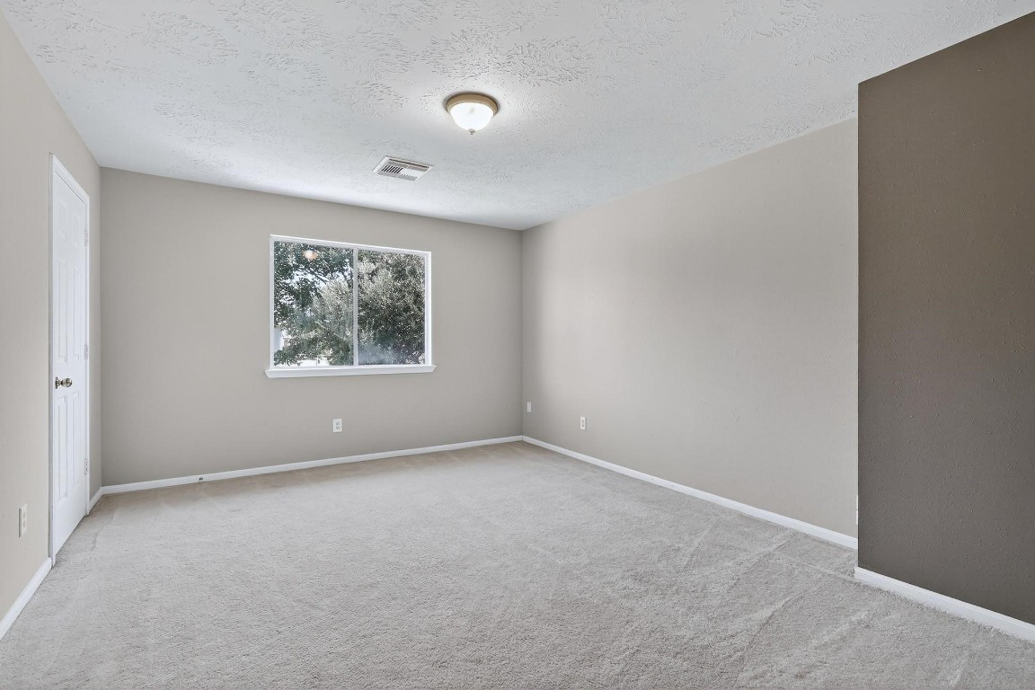 20926 Trellis Lane Houston, TX 77073 - Photo 17 of 22 Second bedroom, with spacious walk in closet.