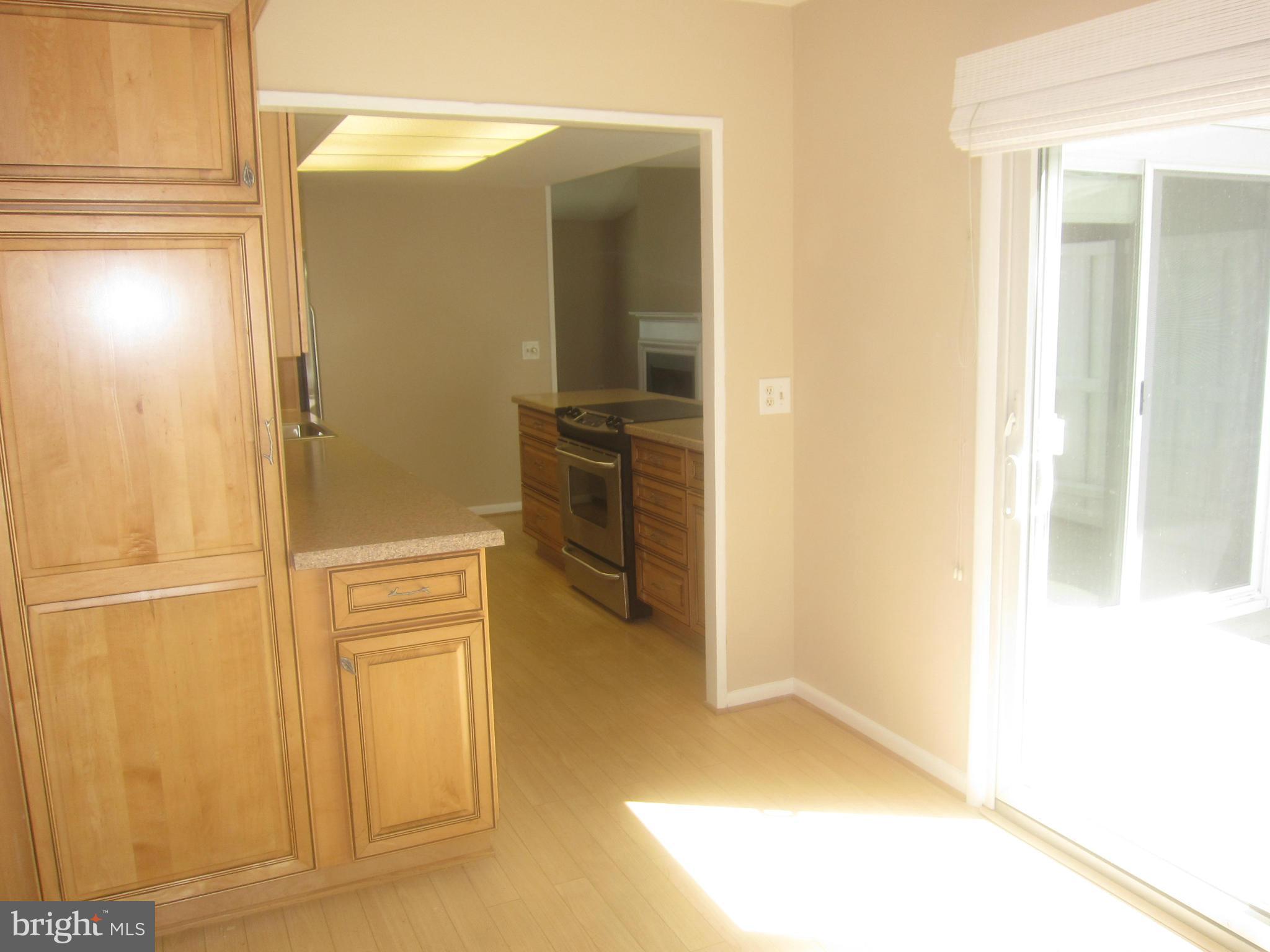 3606 Edelmar Terrace, Unit 128A Silver Spring, MD 20906 - Photo 12 of 30 Den sliders add light, easy access to patio