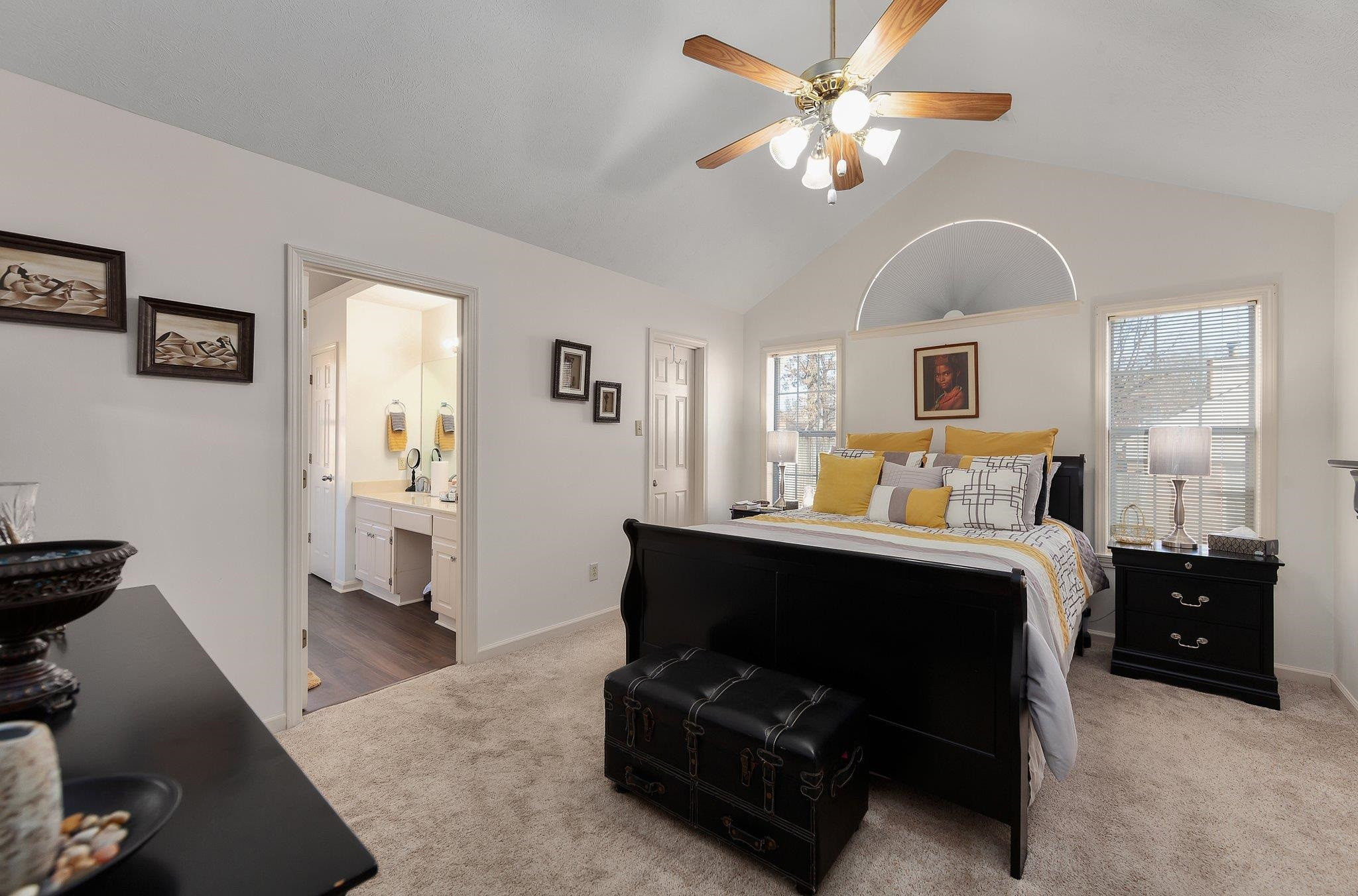 121 Windy Hill Road Jackson, TN 38305 - Photo 15 of 25 a bedroom with furniture and a chandelier