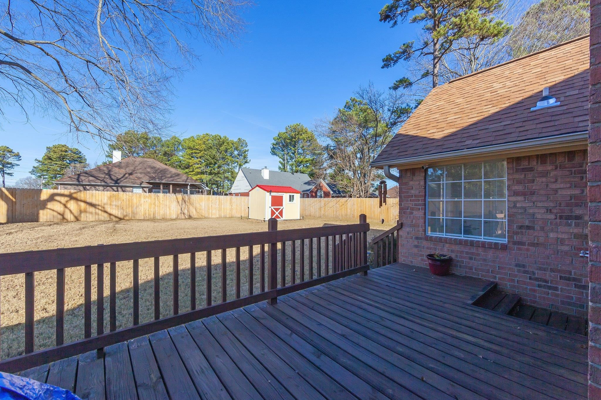 121 Windy Hill Road Jackson, TN 38305 - Photo 20 of 25 a view of a deck and a yard