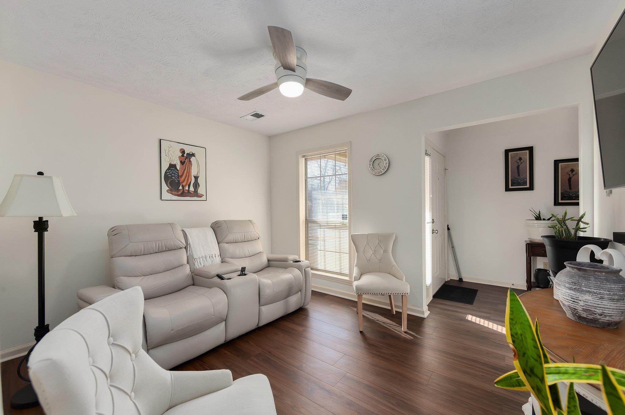 121 Windy Hill Road Jackson, TN 38305 - Photo 4 of 25 a living room with furniture or couch and a wooden floor