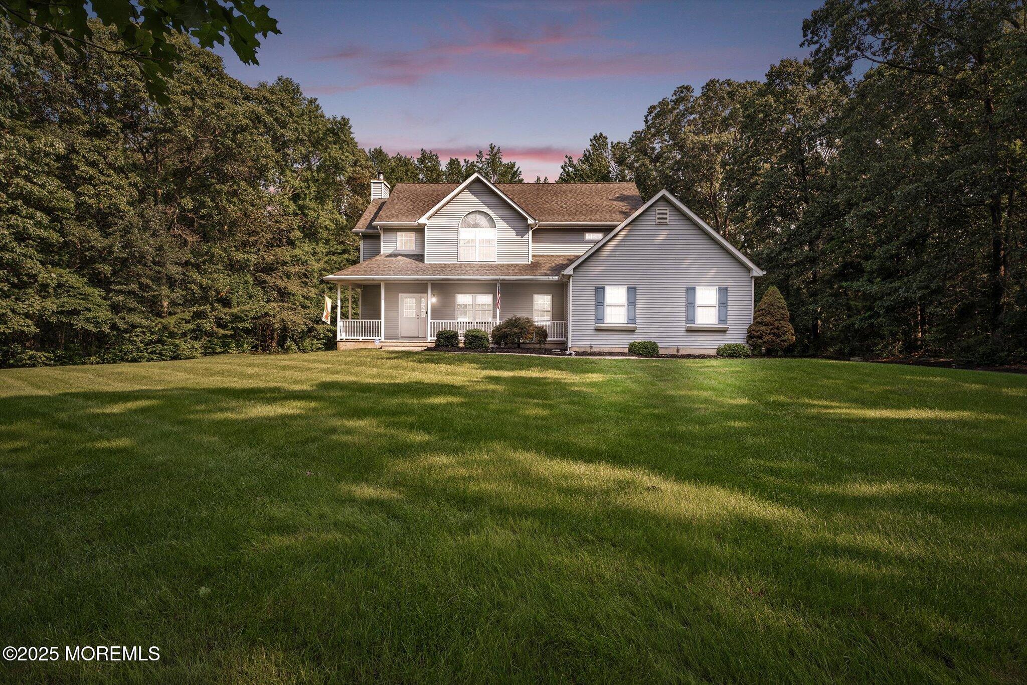 90 Sanders Lane Cream Ridge, NJ 08514 - Photo 1 of 48 a front view of a house with a yard