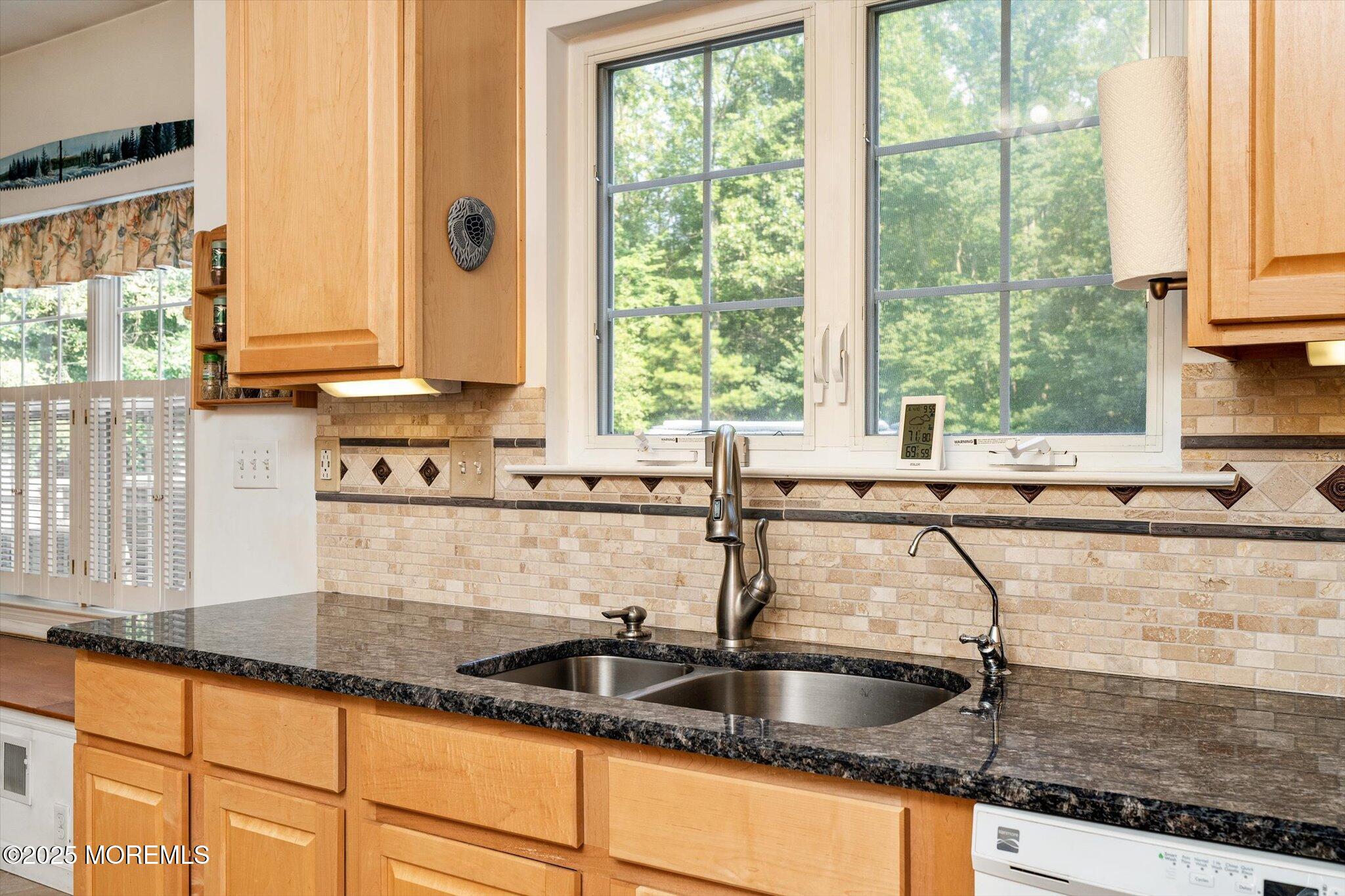 90 Sanders Lane Cream Ridge, NJ 08514 - Photo 16 of 48 a kitchen with granite countertop a sink and a window
