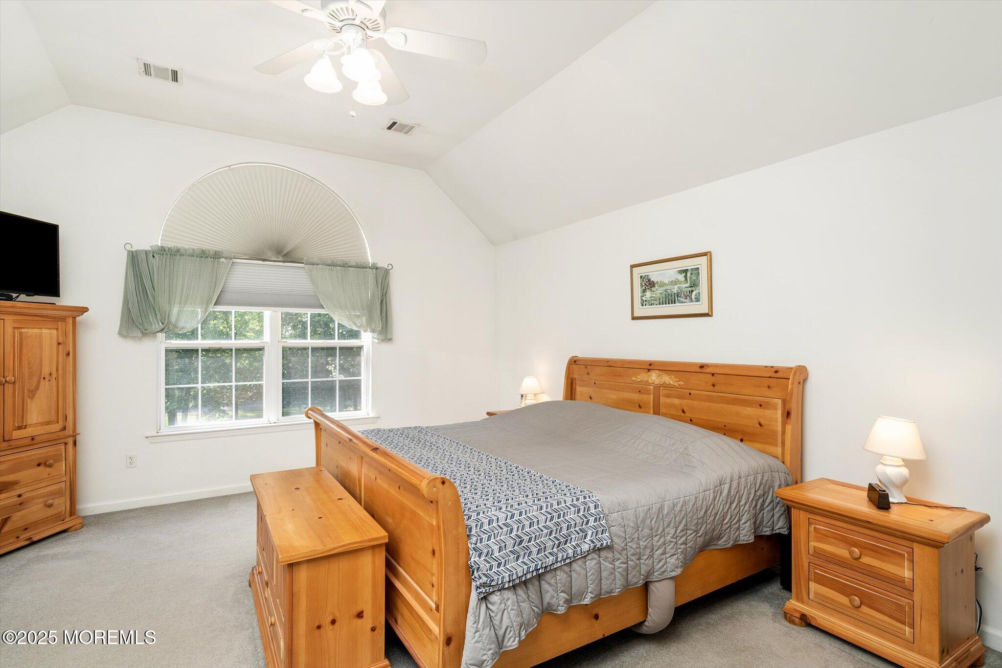 90 Sanders Lane Cream Ridge, NJ 08514 - Photo 20 of 48 a bedroom with a bed and a window