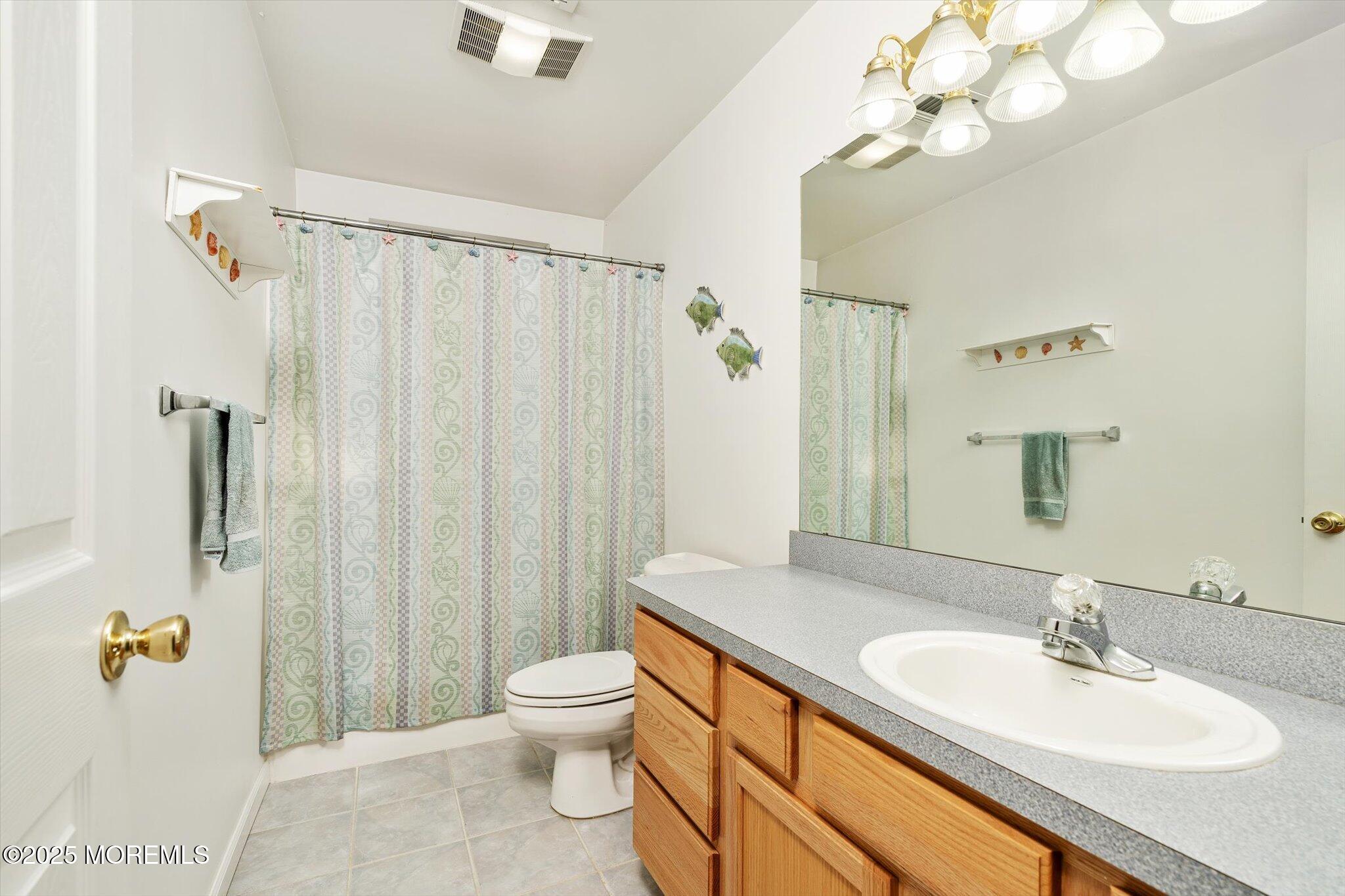 90 Sanders Lane Cream Ridge, NJ 08514 - Photo 24 of 48 a bathroom with a sink a toilet and shower