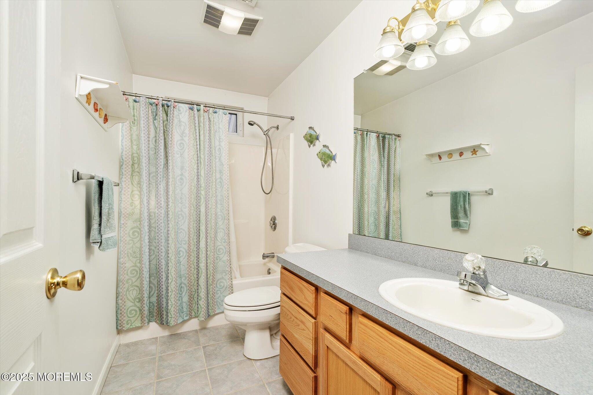 90 Sanders Lane Cream Ridge, NJ 08514 - Photo 25 of 48 a bathroom with a sink a toilet and shower