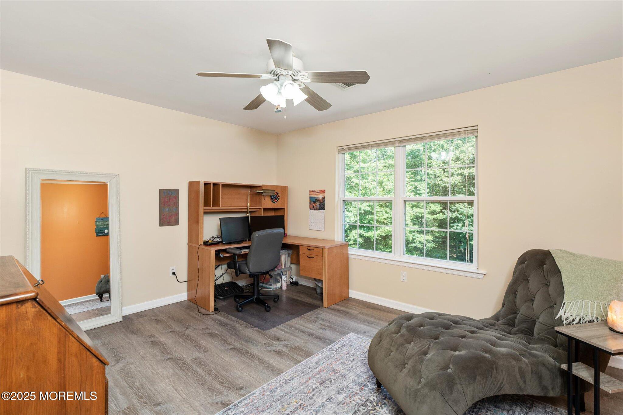 90 Sanders Lane Cream Ridge, NJ 08514 - Photo 28 of 48 a living room with furniture and a flat screen tv