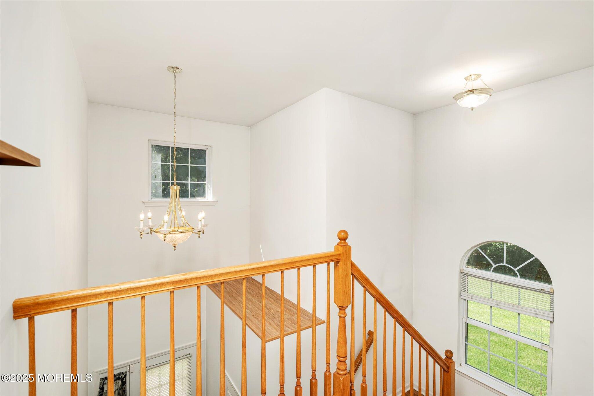 90 Sanders Lane Cream Ridge, NJ 08514 - Photo 29 of 48 a view of a hallway with windows