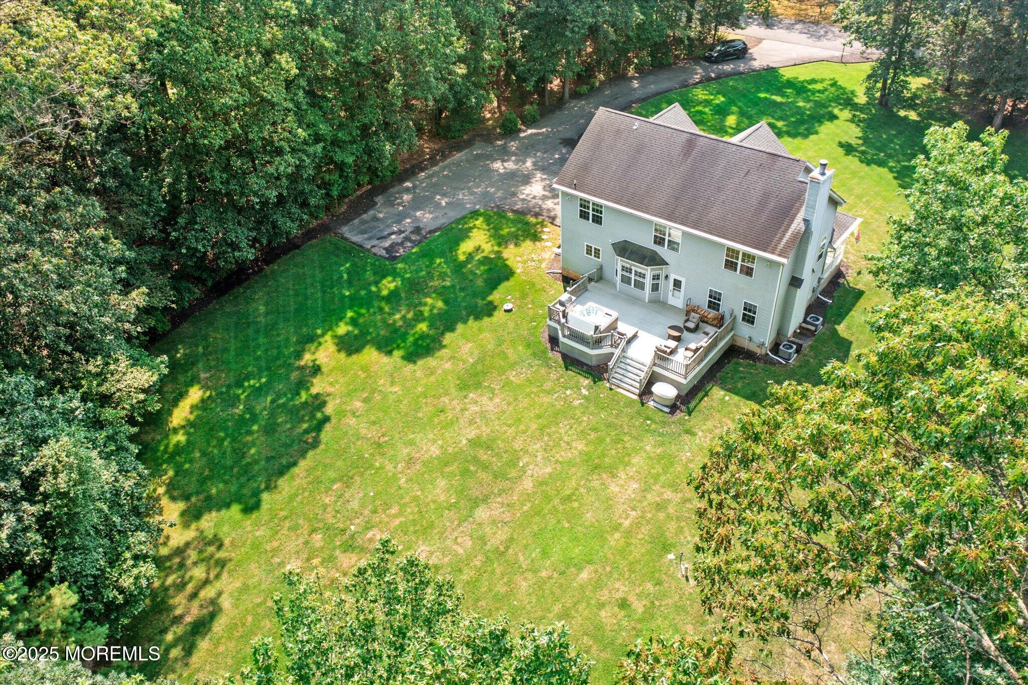 90 Sanders Lane Cream Ridge, NJ 08514 - Photo 41 of 48 an aerial view of a house with pool outdoor seating and yard