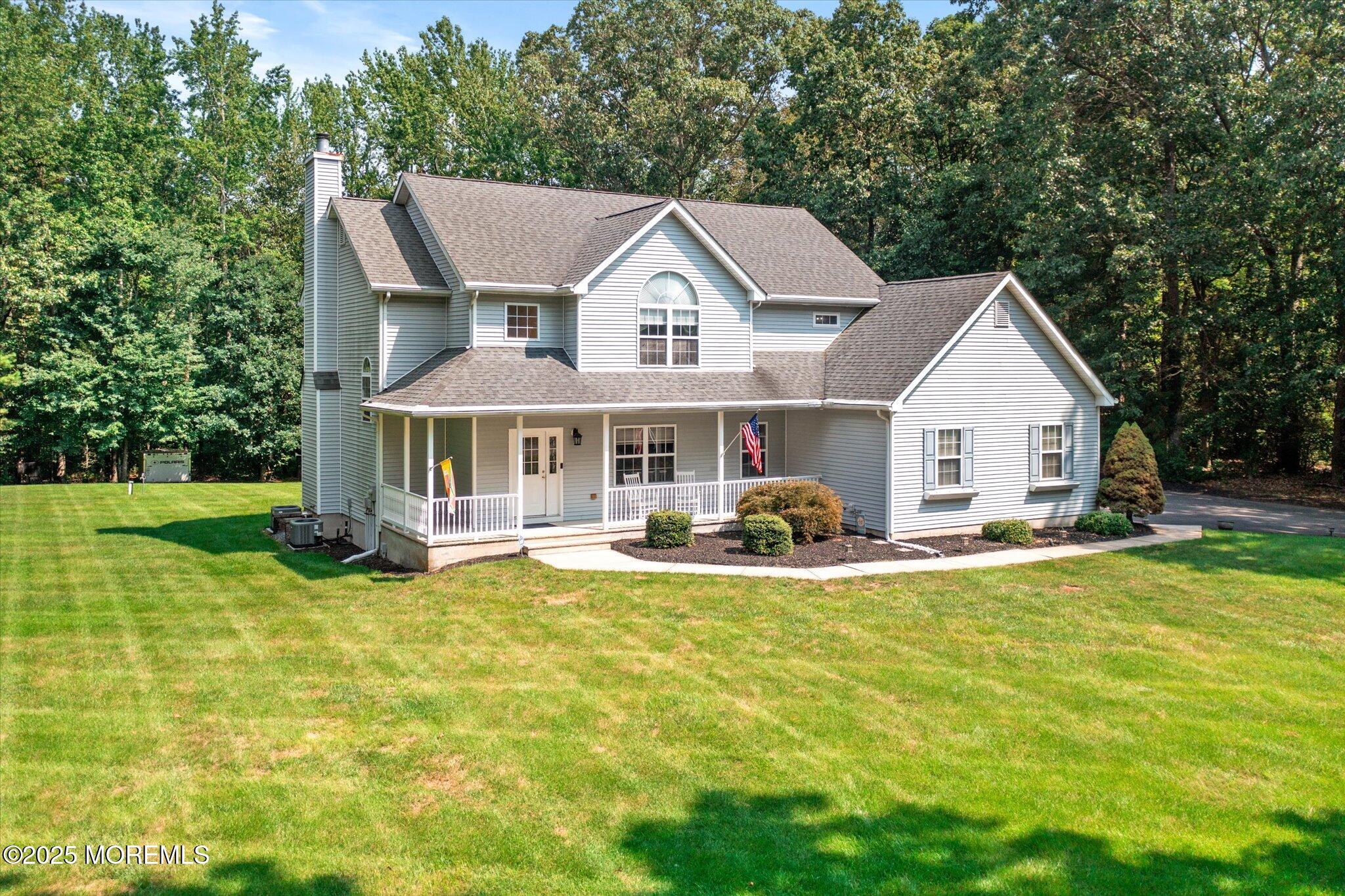 90 Sanders Lane Cream Ridge, NJ 08514 - Photo 46 of 48 a view of a house with a yard and sitting area