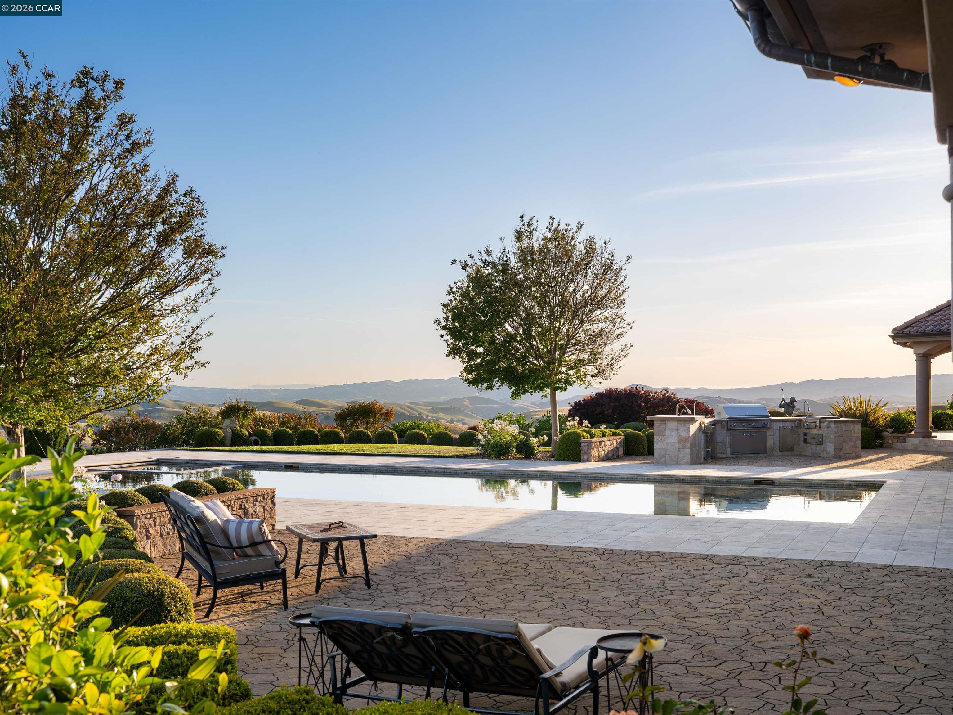 2020 Victorine Road Livermore, CA 94551 - Photo 75 of 99 a view of a chairs and table on the terrace