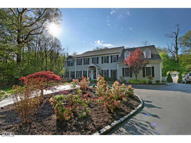 110 Flintlock Road Fairfield, CT 06890 - Photo 1 of 1 a view of a house with a garden