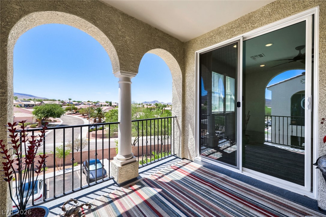 2555 Hampton Road, Unit 9301 Henderson, NV 89052 - Photo 8 of 36 Arched openings frame picturesque views from this inviting balcony.