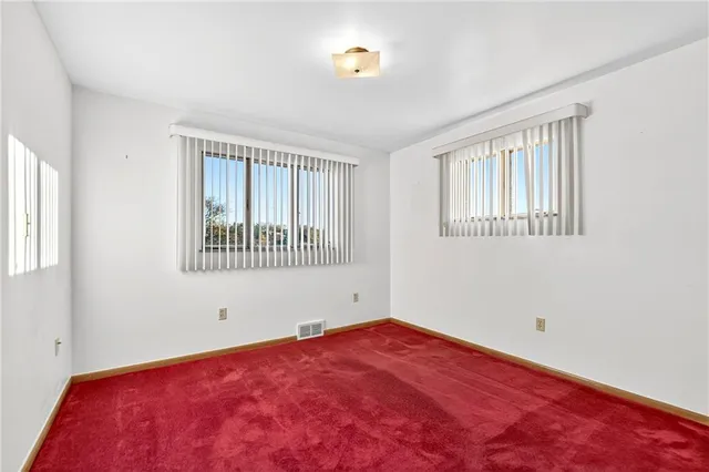 a view of empty room with front door