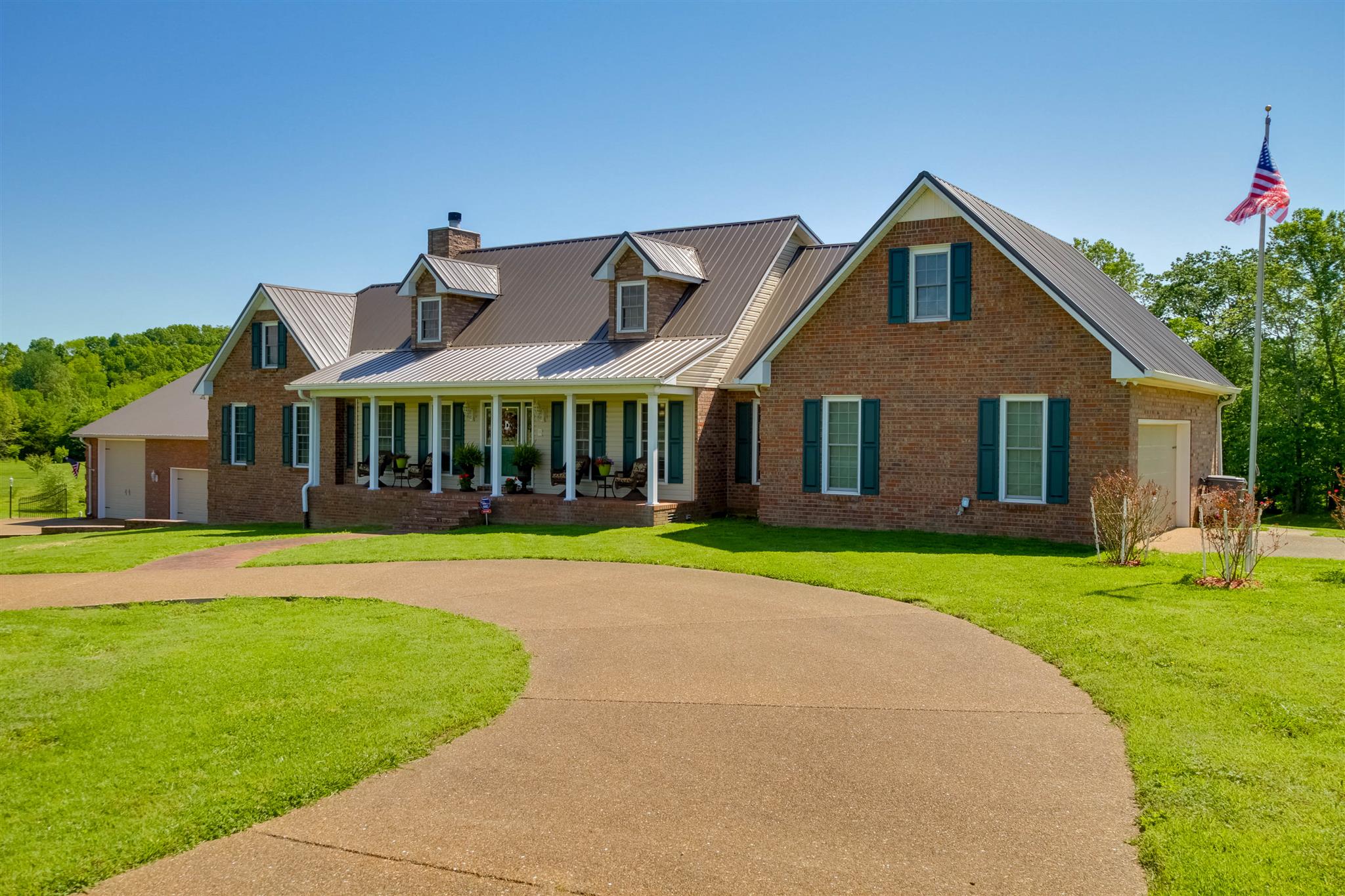 408 Ranch Road Portland, TN 37148 - Photo 2 of 29 Rocking chair front porch, beautiful scenery and lots of land make this a place you will want to live!