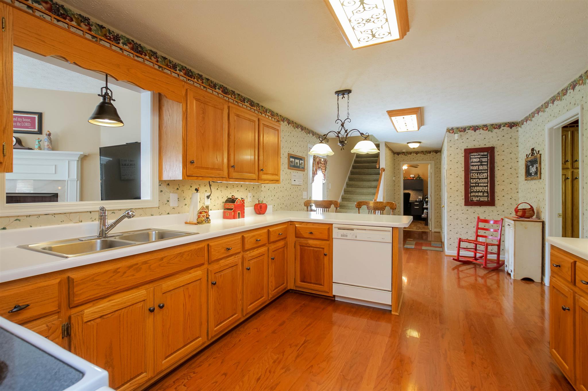 408 Ranch Road Portland, TN 37148 - Photo 3 of 29 Adorable, country kitchen is every cook's dream. Large pass thru window to den area, hardwood floors and under mount lighting.