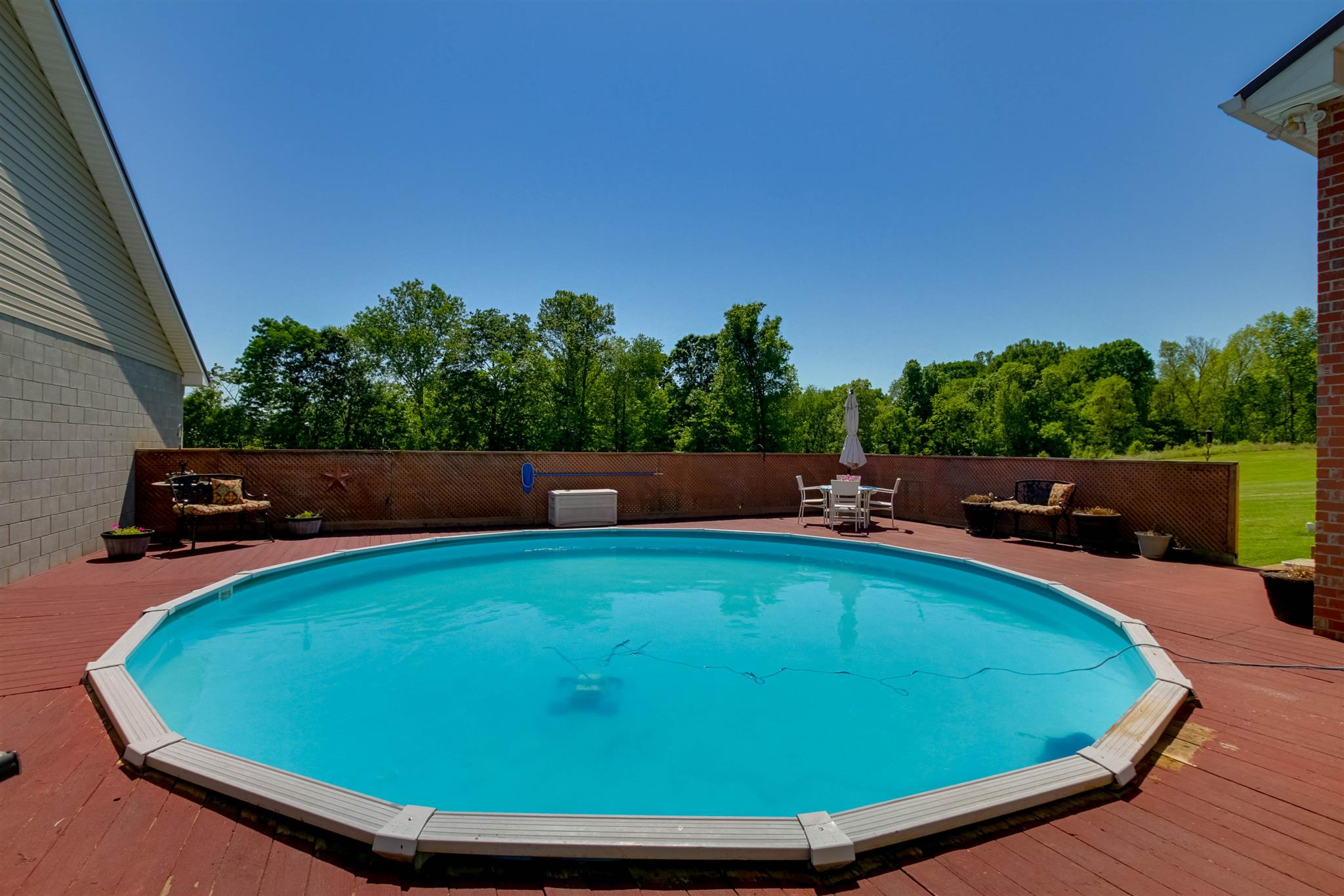 408 Ranch Road Portland, TN 37148 - Photo 24 of 29 Enjoy! Everyone will enjoy this pool on hot, summer days. Large deck for entertaining and a great view of the tree lined yard.