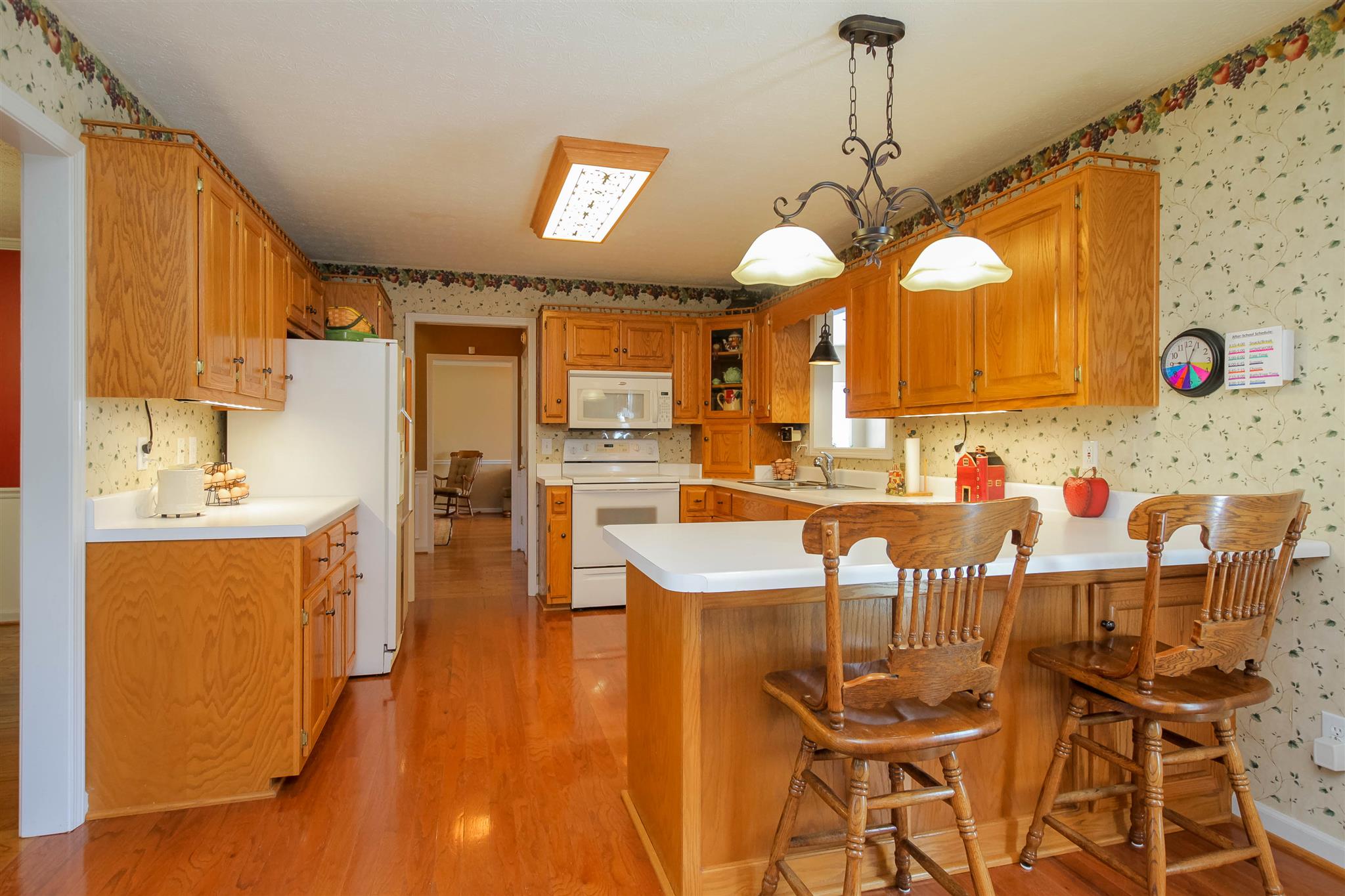 408 Ranch Road Portland, TN 37148 - Photo 5 of 29 Another great view of the kitchen. Easy access to formal dining room and living/gathering room. This room has updated lighting and a nice private patio area right out the back door.