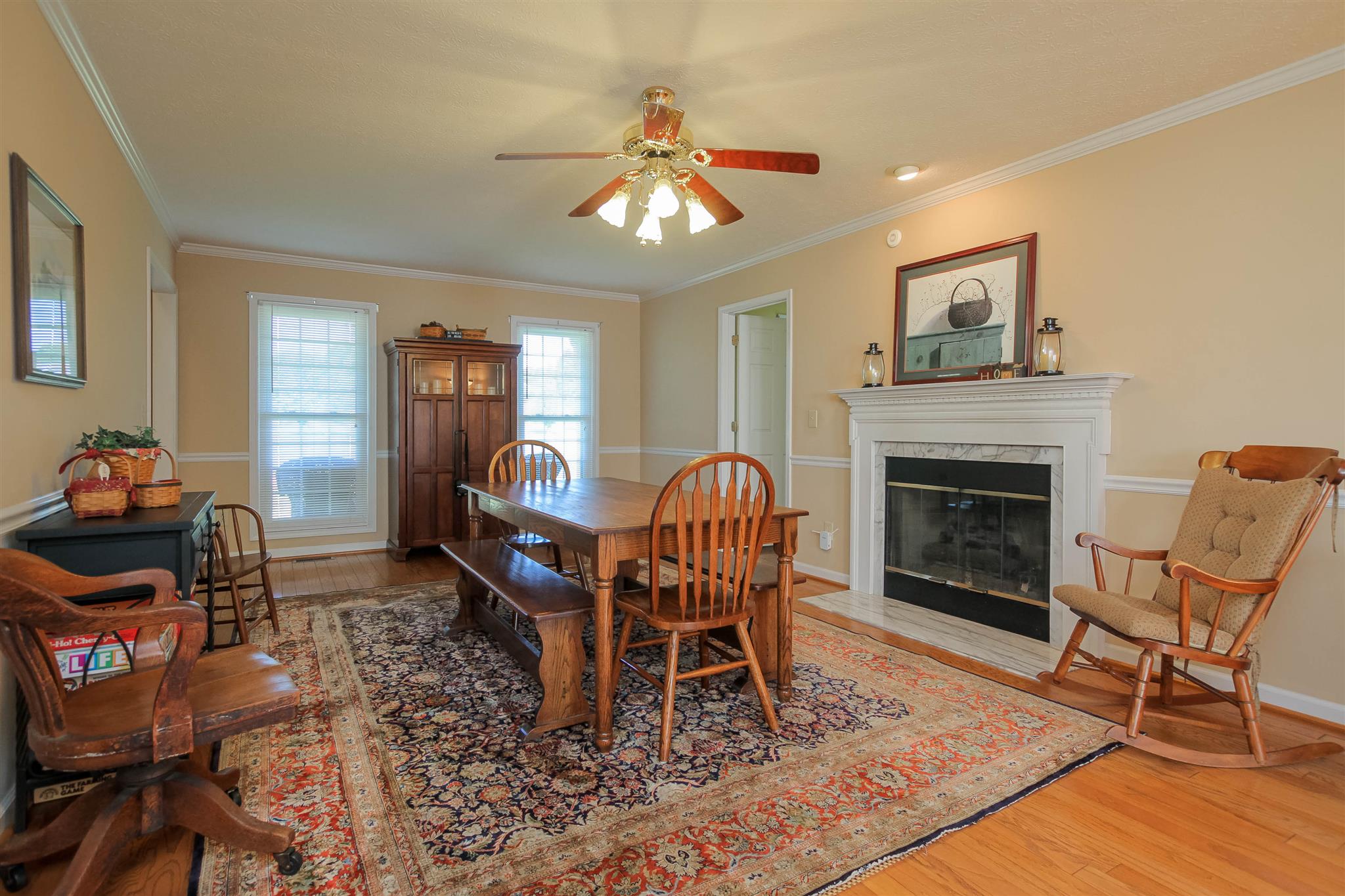 408 Ranch Road Portland, TN 37148 - Photo 10 of 29 The formal living room is being used as a gathering area. The family enjoys gathering around the table and playing games.
