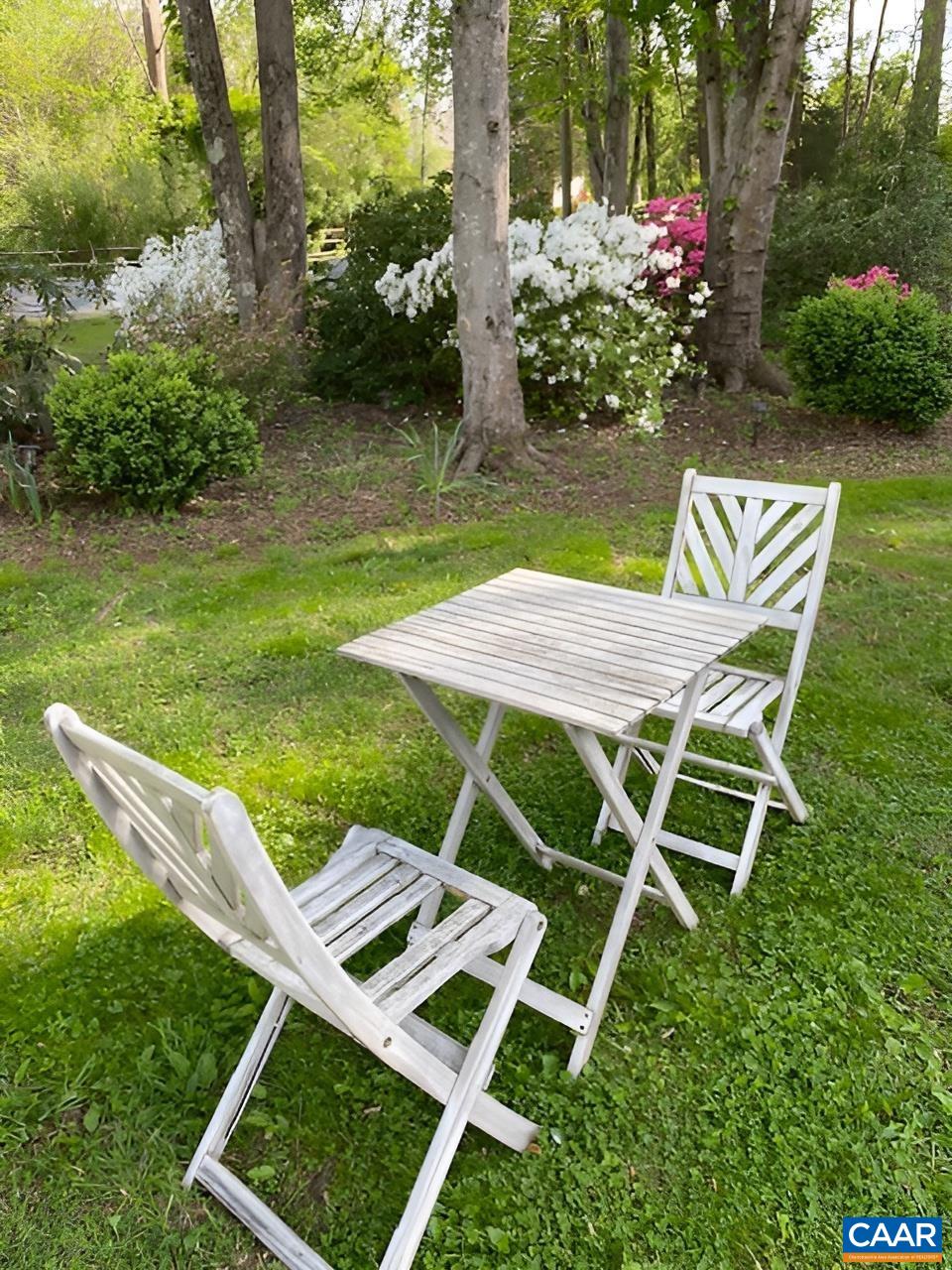 2701 Huntington Road Charlottesville, VA 22901 - Photo 50 of 53 a view of a chair and table in the garden