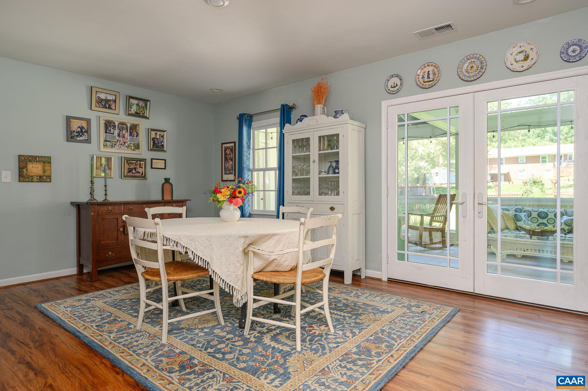 2701 Huntington Road Charlottesville, VA 22901 - Photo 9 of 53 a view of a dining room with furniture and wooden floor