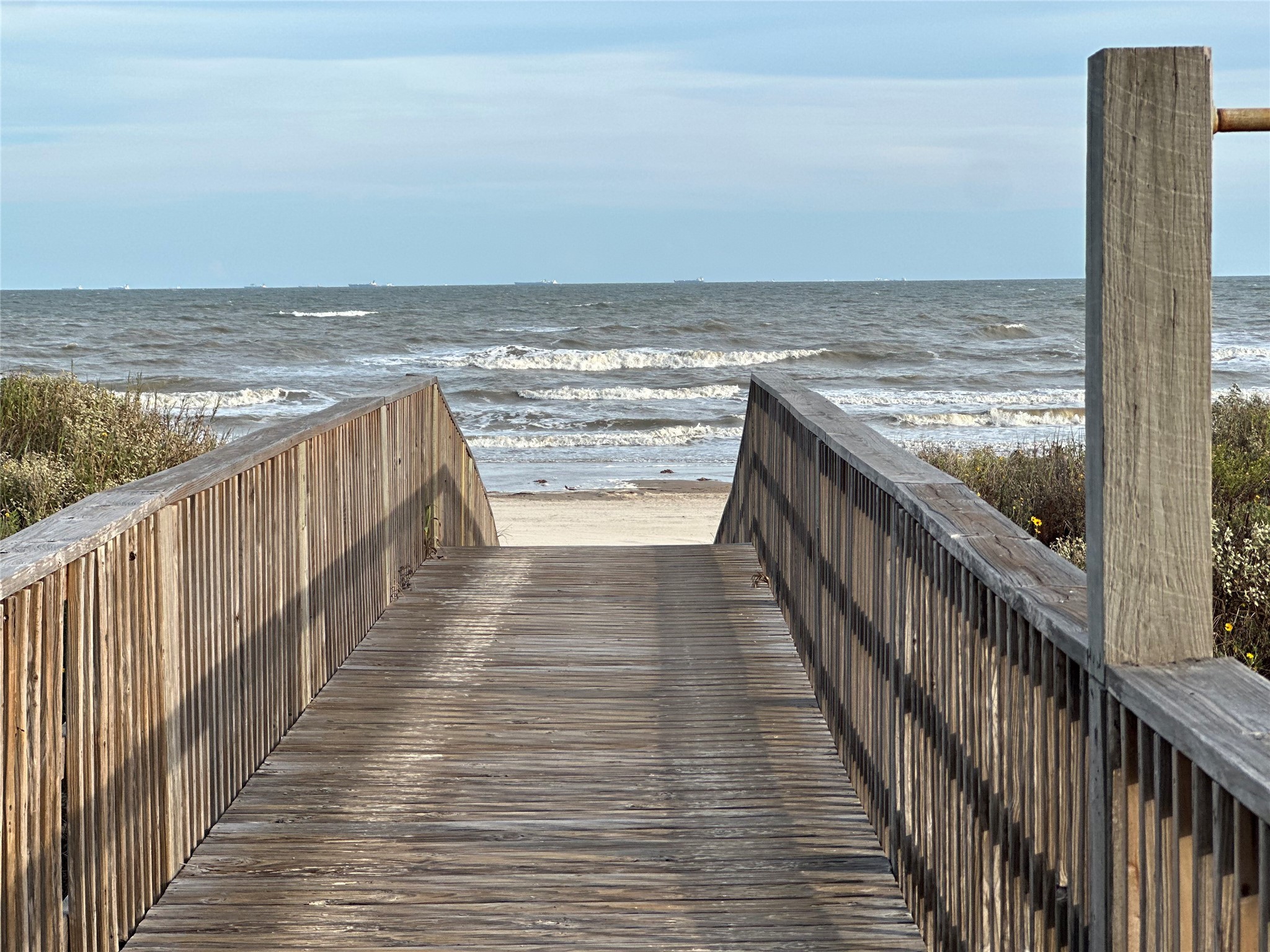 a view of ocean from a balcony