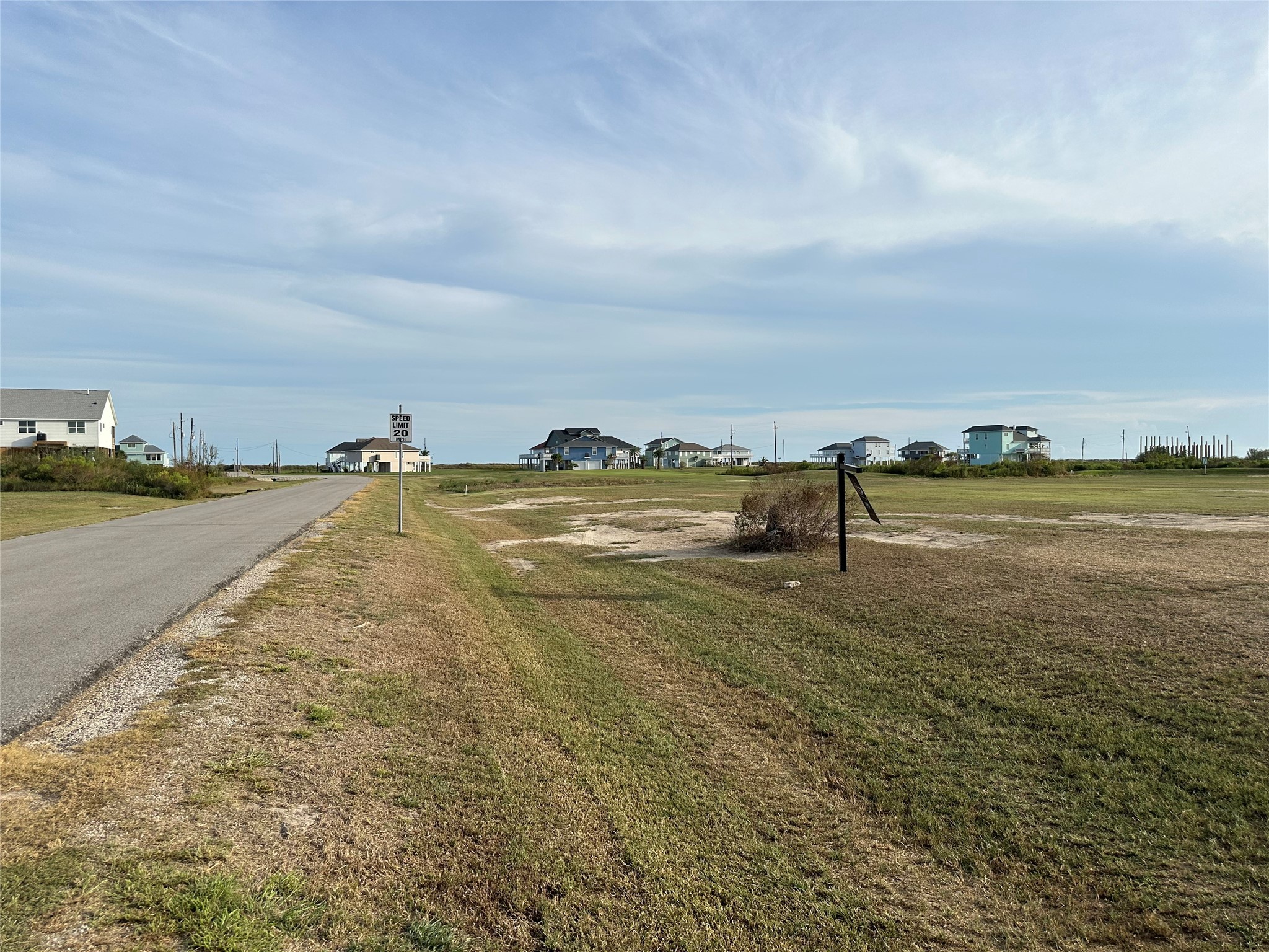 883 Ranch Road Crystal Beach, TX 77650 - Photo 11 of 14 a view of a lake with houses in back
