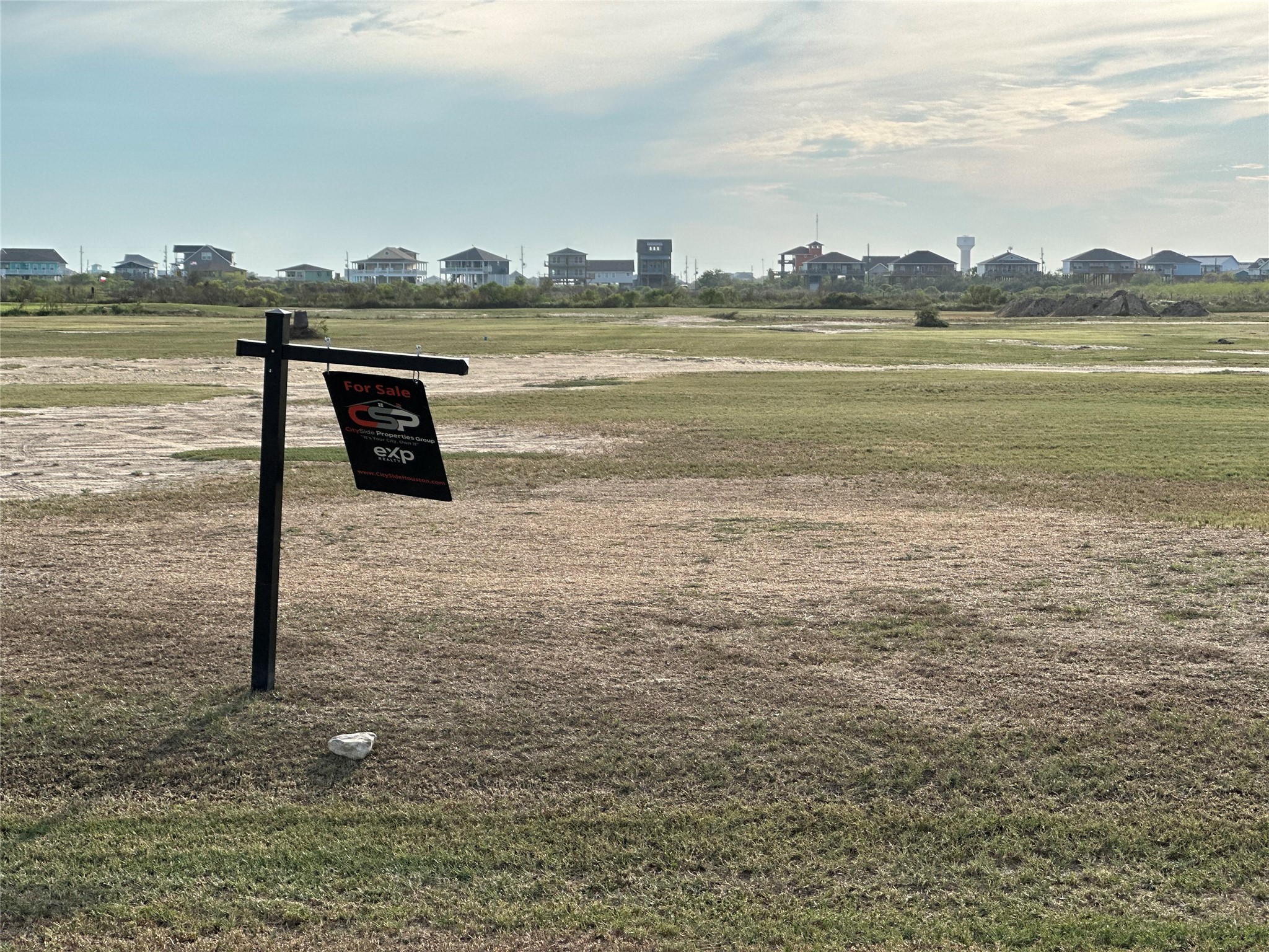 883 Ranch Road Crystal Beach, TX 77650 - Photo 12 of 14 a view of a lake with a mountain