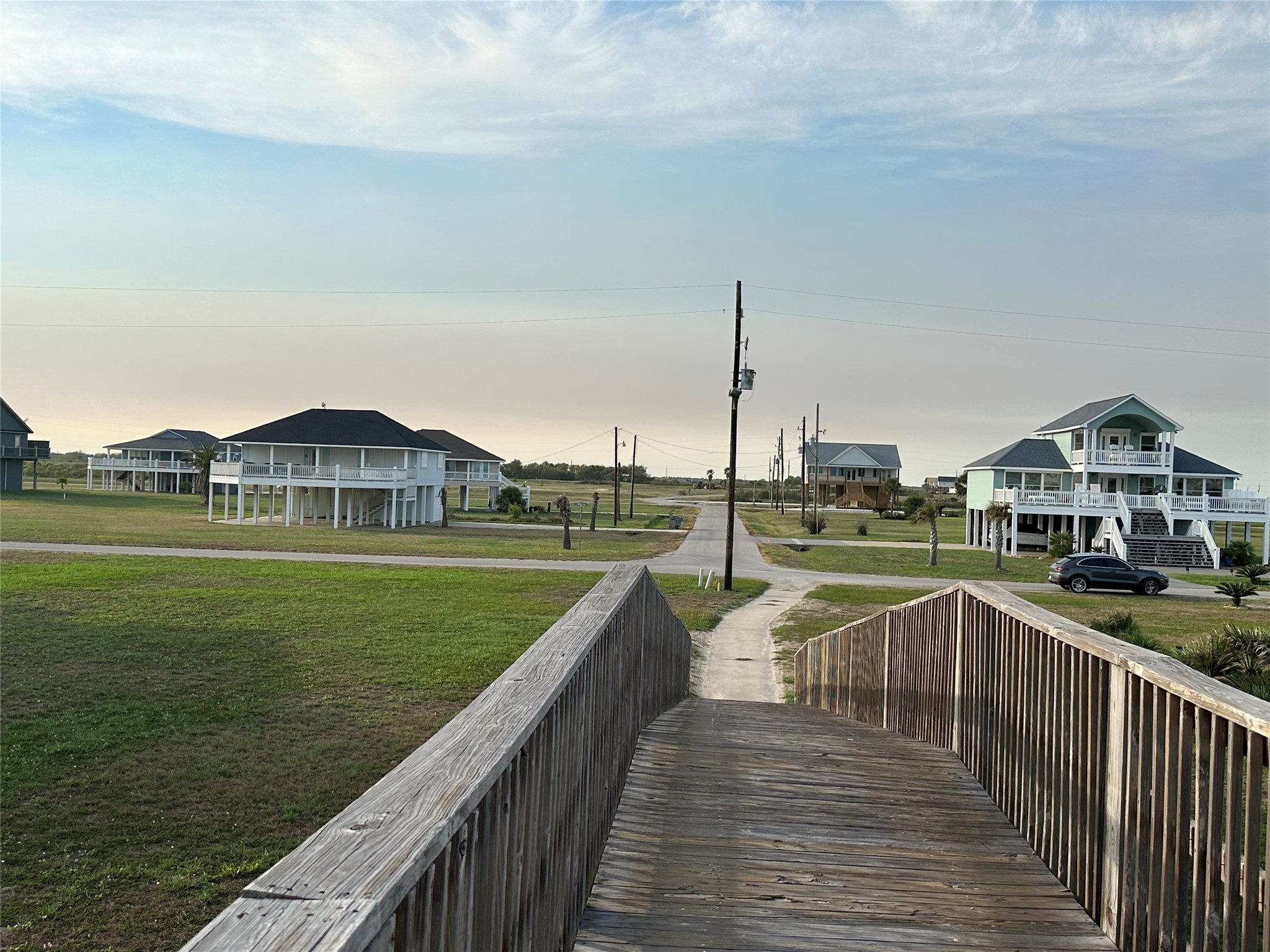 883 Ranch Road Crystal Beach, TX 77650 - Photo 2 of 14 a view of a house with swimming pool