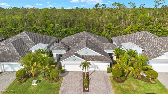 a view of a garden with an house and a garden