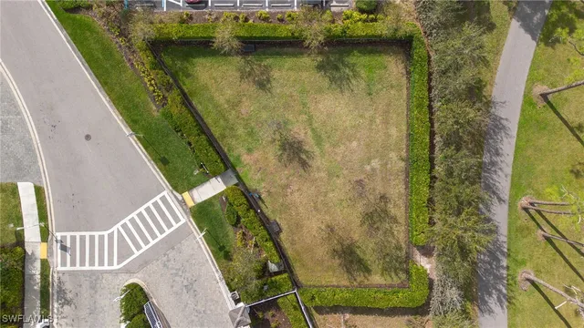 aerial view of a house with a lake view